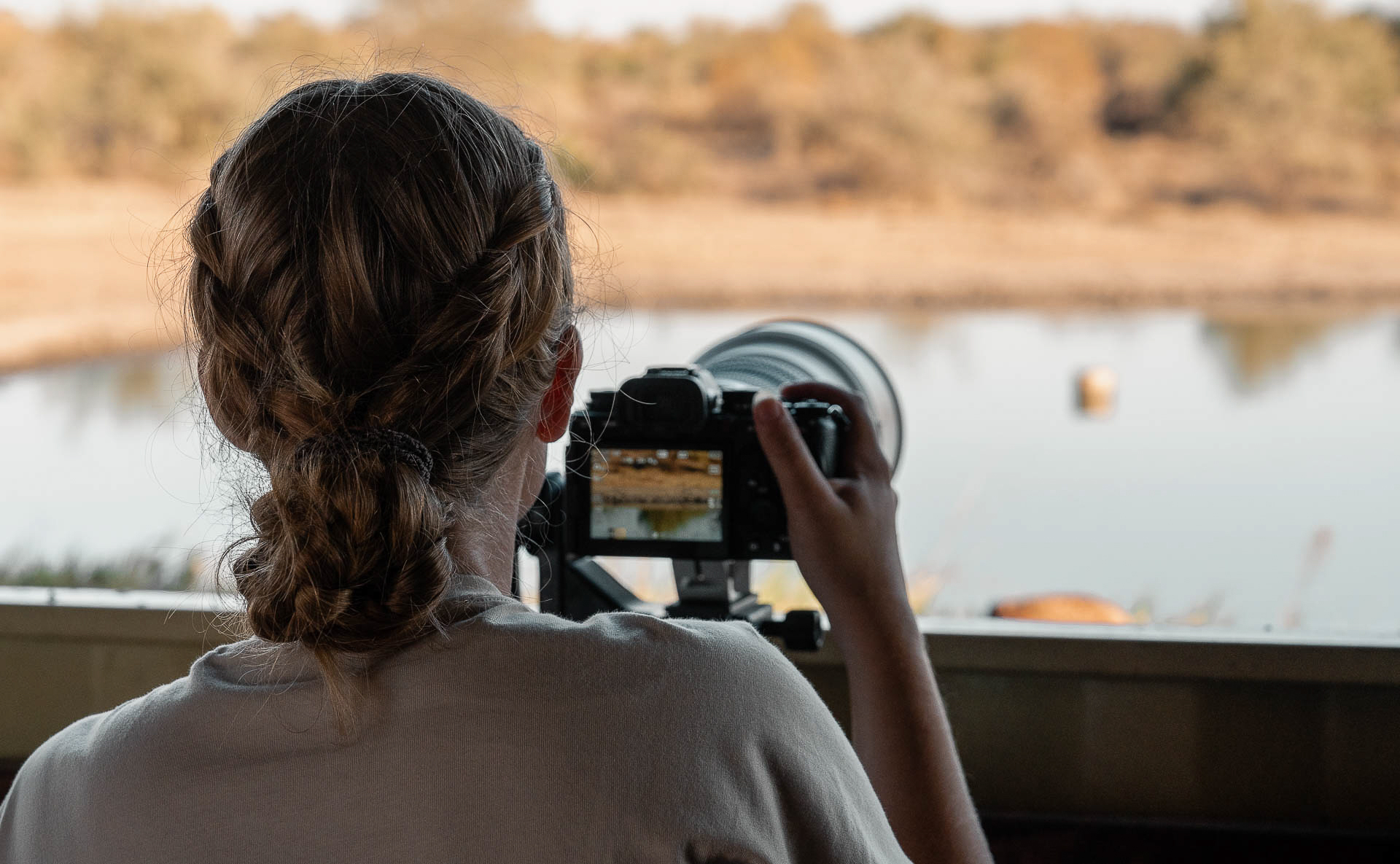 Photographer Karolina Norée taking pictures from our photo hide