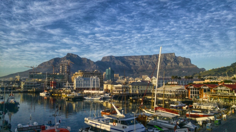 Photograph of the waterfront in Cape Town, with Table Mountain in the back